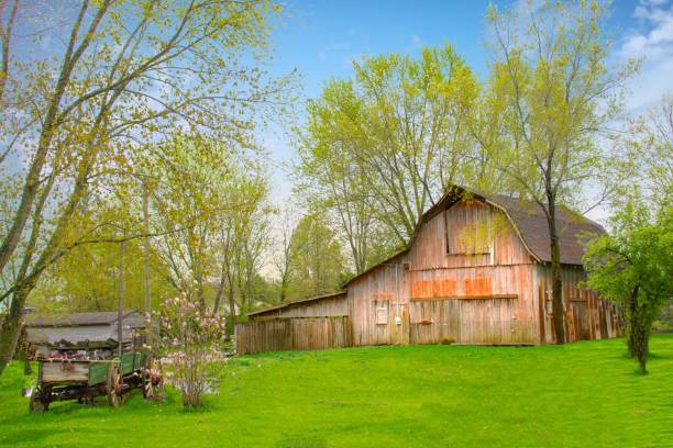 istock Old Weathered Red barn with wagon-Howard County, Indiana 1463115656