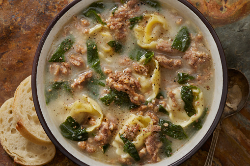 Creamy Cheese Tortellini with Spicy Italian Sausage Soup with Spinach and Fresh Bread