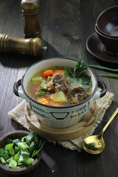istock soup with potatoes, carrots, celery and beef 1463117196
