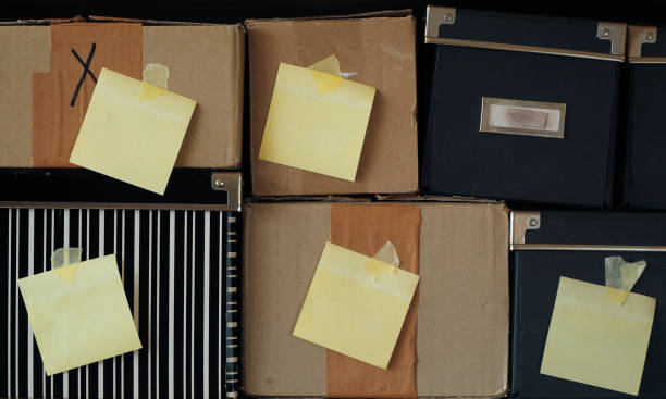 istock various grungy cardboard boxes with empty, blank adhesive labels, free copy space 1463121260