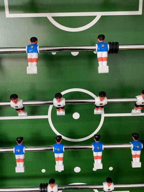 Figures on a soccer foosball table