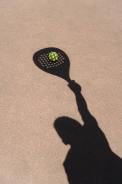 istock Shadow of padel racket over ball 1463129356
