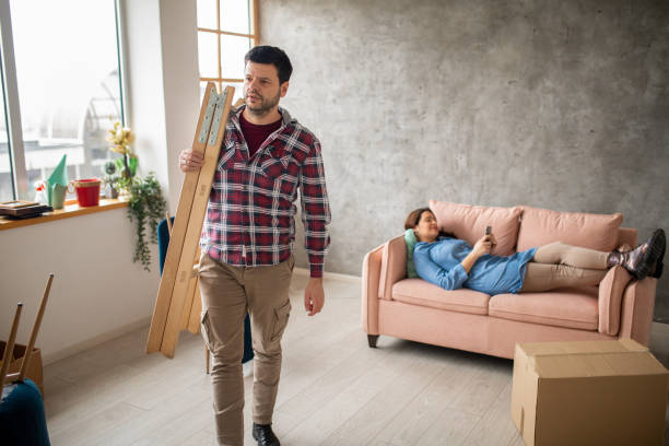 istock Couple in new home 1463132792