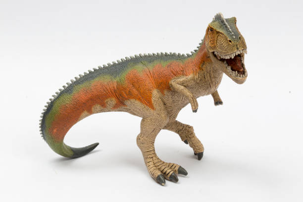 istock Close-up dinosaur toy isolated on white background. 1463136537