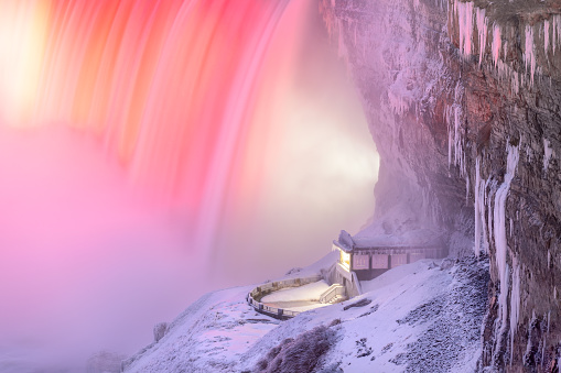 Frozen Niagara Falls with snow and ice covering a viewing platform during a polar vortex - Ontario Canada