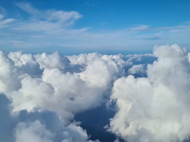 istock clouds seen from an airplane with the sea in the background 1463145198
