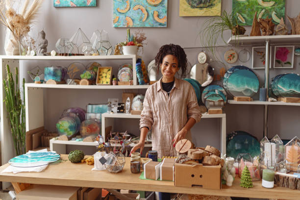 istock Smiling Woman working in home decor studio with elements of interior decorations 1463145271
