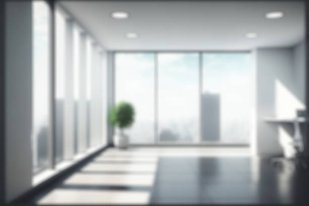 Blur background of empty modern office background in city center . Workspace interior design . Clean and bright office gallery background