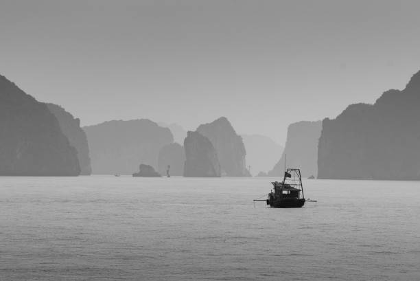 istock Small Boat on Ha Long Bay 1 1463162362