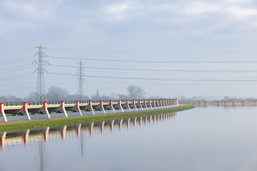 Bridge, inlet to high water area and water barrier Tollbrug at IJsseldike in Markluiden municipality Heerde in Gelderland The Netherlands