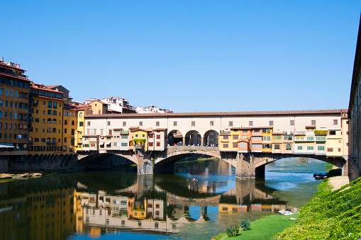 Beautiful view of Ponte vechio, old bridge in Florence over Arno river. Italy