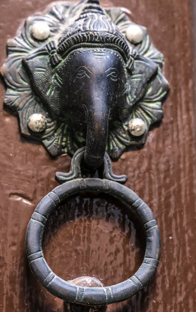 istock Old wooden door and vintage knocker 1463178158