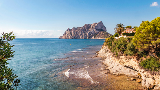 Mediterranean coast landscape in the city of Calpe. rock of penon ifach in the background. . coastal city located in the Valencian community, Alicante, Spain