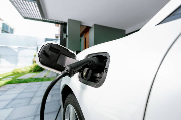 istock EV car plugged-in with cable from progressive home charging station. 1463190579