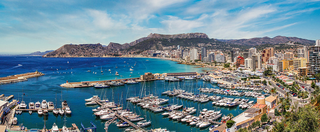 panoramic view of a marina and beaches and mountains in the background in the city of Calpe. Coastal city located in the Valencia Community, Alicante, Spain