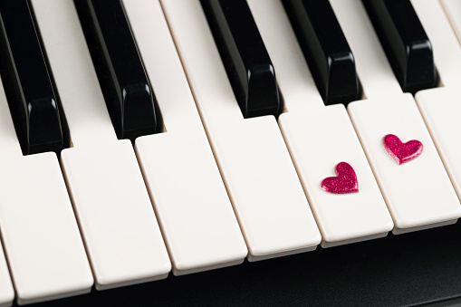Piano with pink hearts
