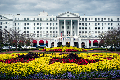 Exterior of the Greenbrier Hotel, which houses a massive nuclear bunker built for the US government during the Cold War. The fallout shelter was kept stocked ready for operation until a journalist exposed in the Washington Post. Now it is open to the pubic for tours, White Sulphur Springs, West Virginia, USA