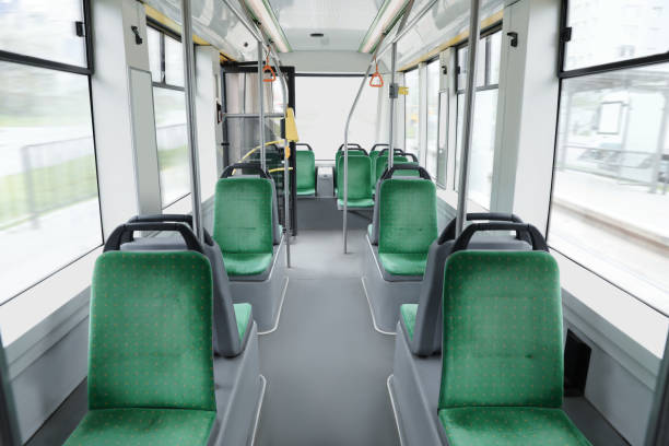 istock Public transport interior with comfortable green seats and handgrip handles 1463219642