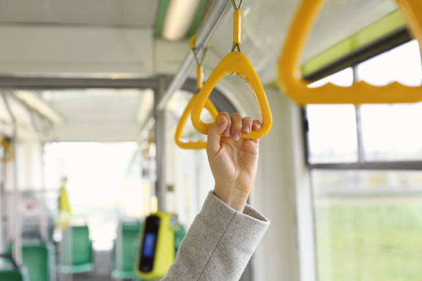istock Woman holding handgrip handle in public transport, closeup 1463219657
