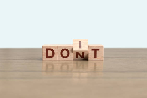 istock Wooden block cube flipping DONT to DOIT 1463224105