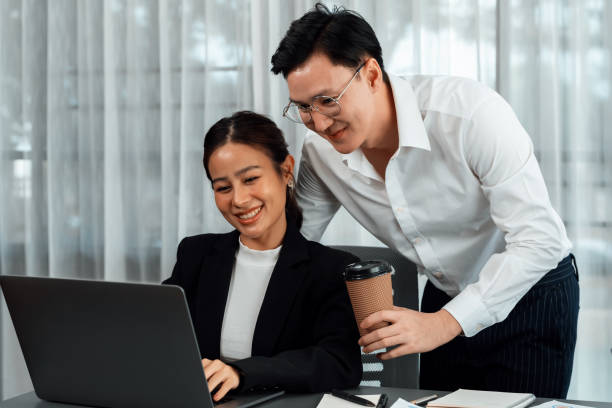 istock Manager with coffee advice colleagues as concept of harmony in office. 1463226292