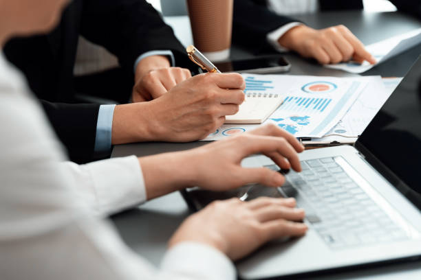 istock Closeup focus on BI dashboard with office worker in harmony office. 1463226778