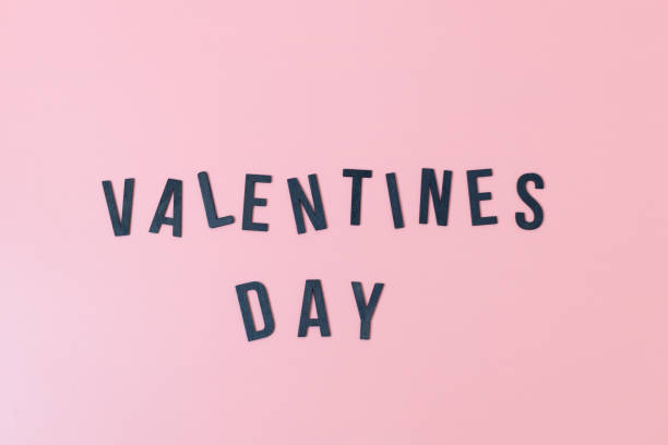 istock Inscription from black letters: Valentine's day on pink. 1463232429