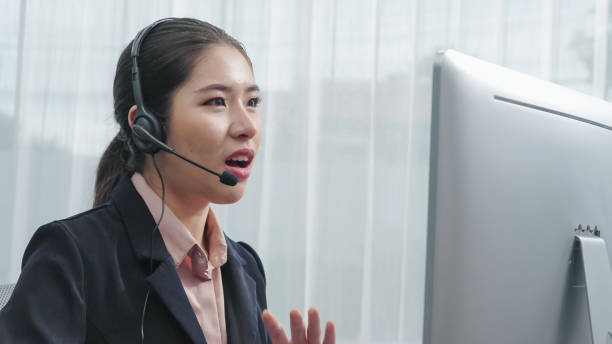 Enthusiastic female operator provide helpful customer service to customer.