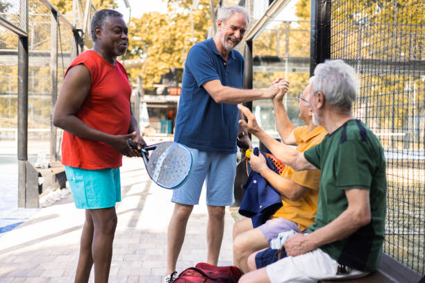 istock Senior friends meeting for a weekend padel play 1463251919