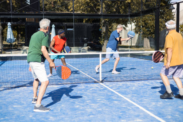 istock Senior friends playing padel for the weekend 1463252083