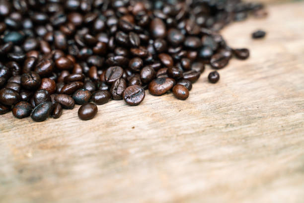 Coffee beans on old rusty brown wood background drinkking business