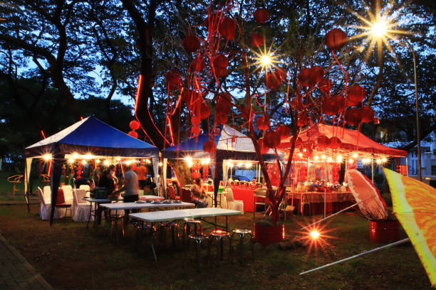 istock Tents and decorative lights at night 1463267219