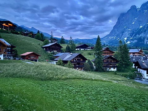 photographing the village of grindelwald and the bernsese oberland alps.