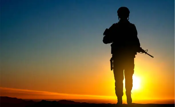 Vector illustration of Silhouette of a walking soldier