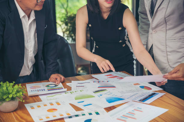 istock Business strategy team report chart, graph, infographic data analyze financial report plan. Hands team partner planning marketing finance statistics sale report with excel spreadsheet accountting 1463281158