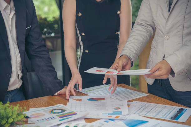 istock Business strategy team report chart, graph, infographic data analyze financial report plan. Hands team partner planning marketing finance statistics sale report with excel spreadsheet accountting 1463281184