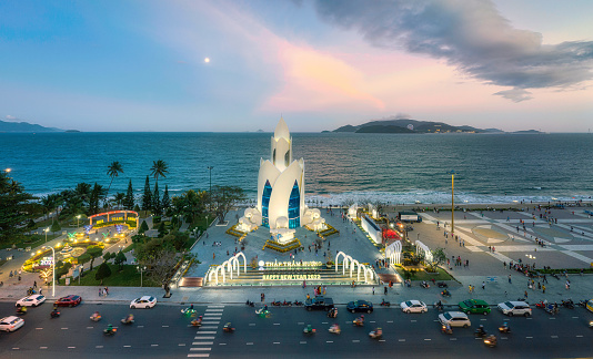 Drone view Tram Huong tower on Nha Trang beach which was decorate for Lunar New Year festival 2023 - Nha Trang city, Khanh Hoa province, central Vietnam