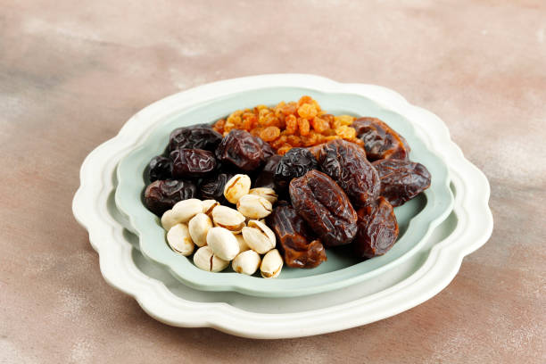 istock Pistachio, Dates Fruit, and Golden Raisin for Iftar Ramadan 1463288440