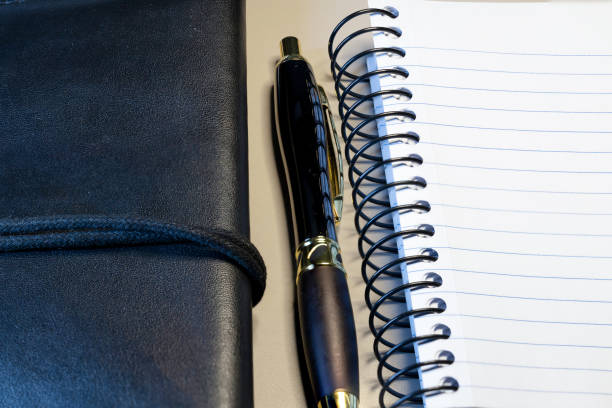 istock Notebook and pen. Business concept 1463294179