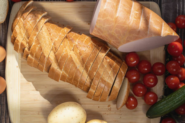 istock Still life with food.  Eggs, bread and vegetables 1463297345
