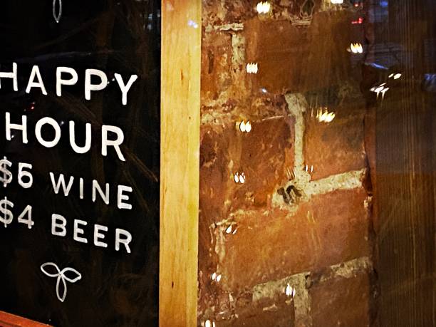 istock Happy Hour Sign with Sparkling Lights 1463300866