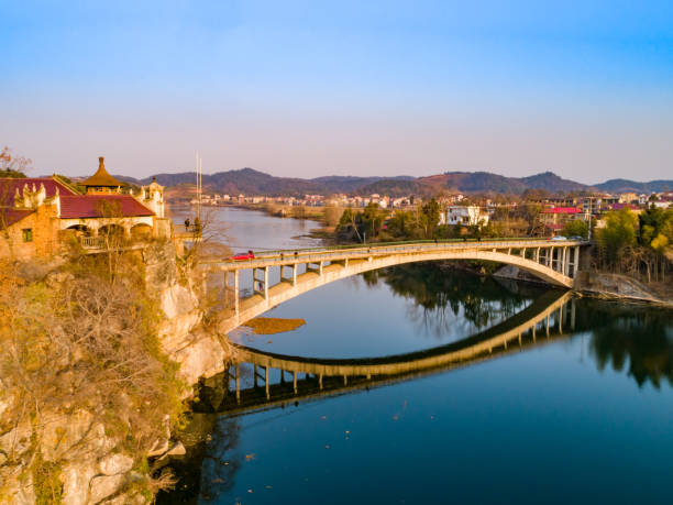 istock A single-arch bridge across a river, Hunan, China 1463311154