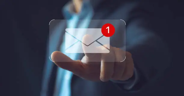 Photo of New email notification concept for business e-mail communication and digital marketing. Inbox receiving electronic message alert. business people touch on email in virtual screen. internet technology