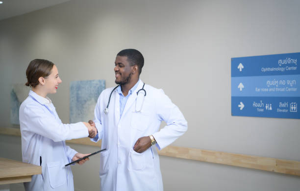 istock Both of doctors are analyzing the patient's MRI results on tablet to share ideas and discover new information for the patient's benefit in their treatment. 1463321734