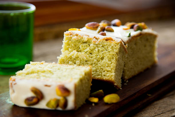 istock Pistachio sponge cake covered in icing sugar. 1463327615