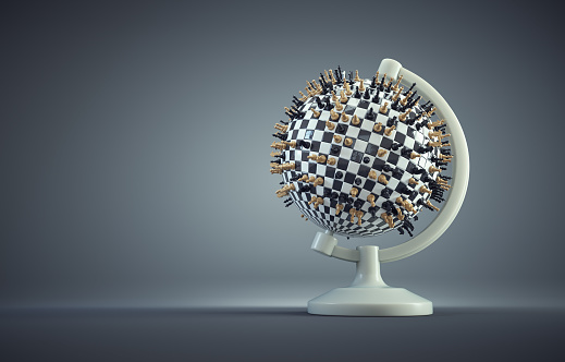 The world globe with chess pieces. Geopolitics and economic crisis.  This is a 3d render illustration