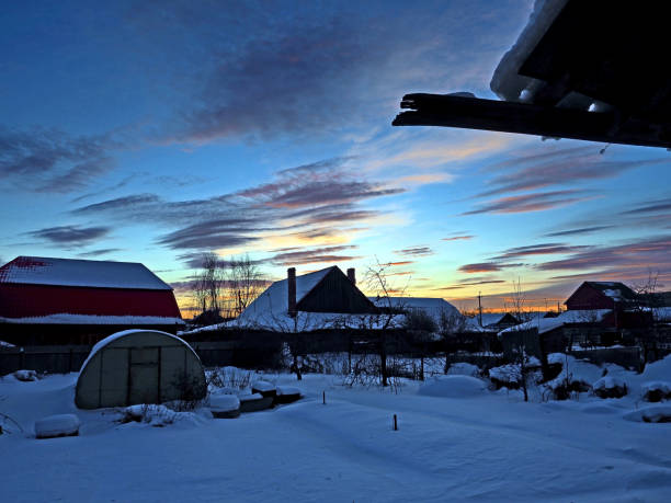 bright colorful winter sunset sky in the countryside