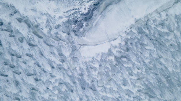 istock Top view on abstract artistic texture of frozen lake surface 1463341608