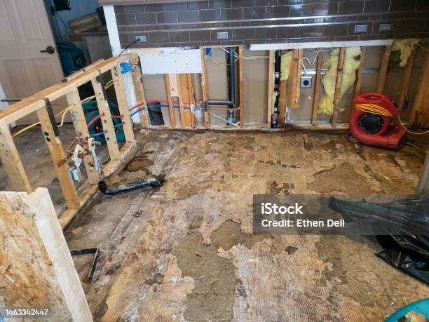 Kitchen Demolition After A Frozen Water Pipe Broke Stock Photo - Download Image Now - Accidents and Disasters, Baseboard, Bathroom