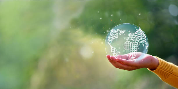 istock Hand holding earth in morning, , ecology and environment sustainable concept. 1463355456